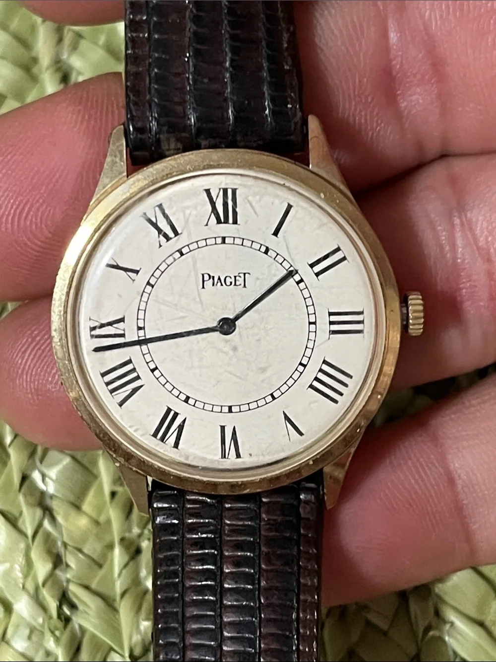 Piaget Silver Case Watch with Black Leather Strap and White Dial
